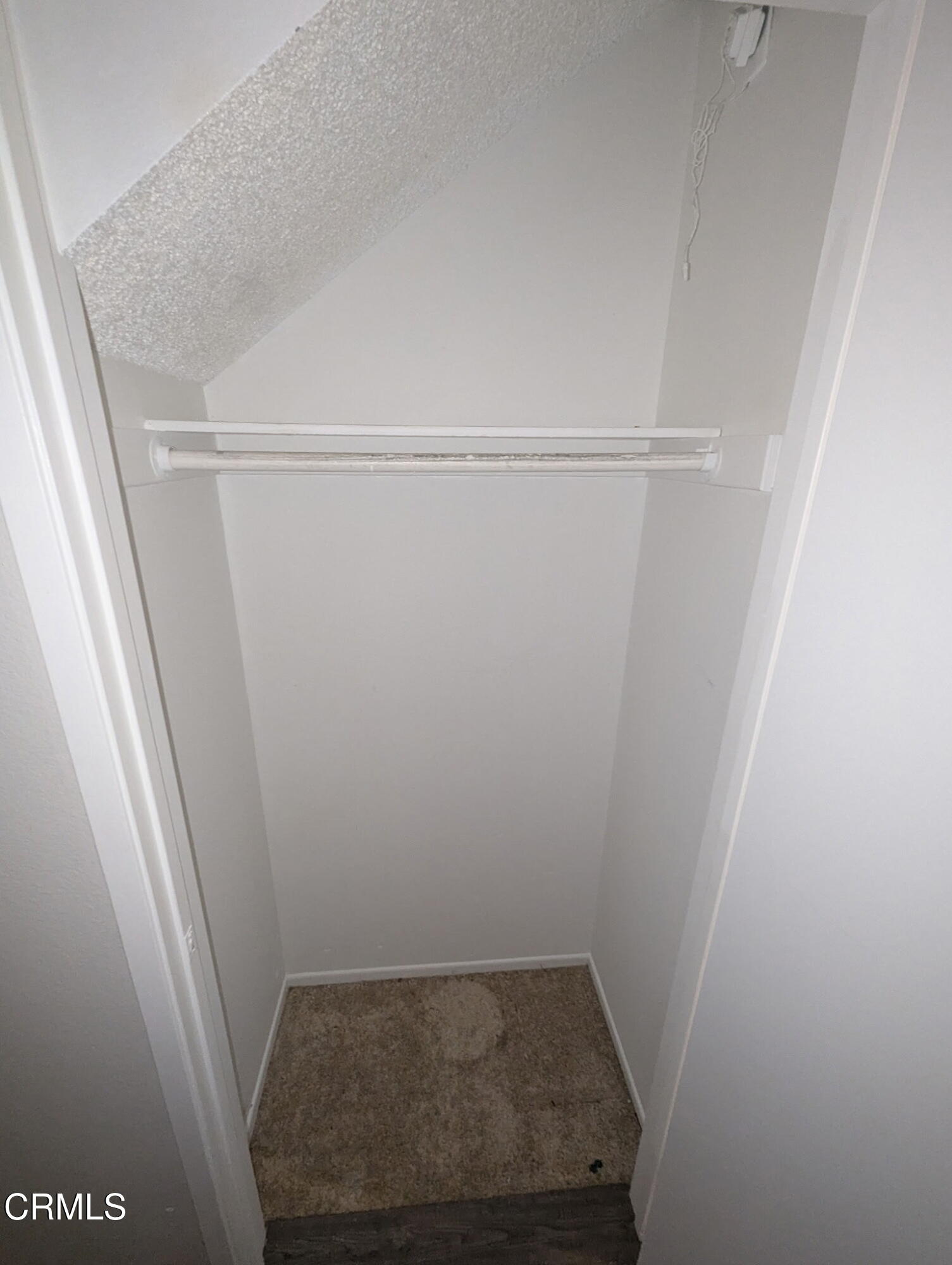 1851 Patricia Avenue, Unit 102 Simi Valley, CA 93065 - Photo 8 of 23 a view of small space with racks on the wall