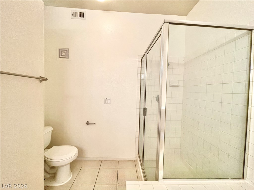 2201 Ramsgate Drive, Unit 915 Henderson, NV 89074 - Photo 32 of 36 A well-maintained bathroom offers practicality with a convenient shower and toilet.
