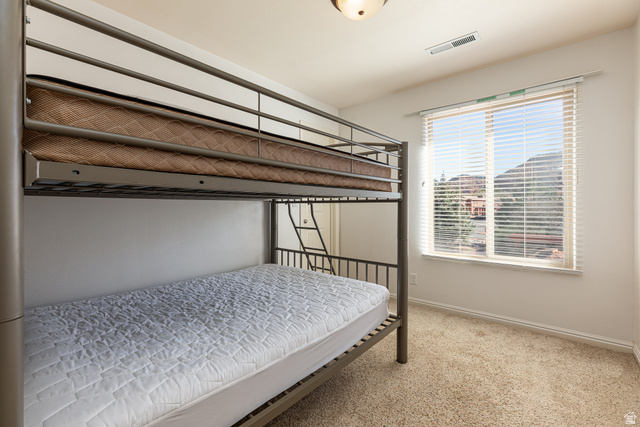 6 300th Road North, Unit I6 Kanab, UT 84741 - Photo 26 of 37 Bedroom with baseboards and light carpet