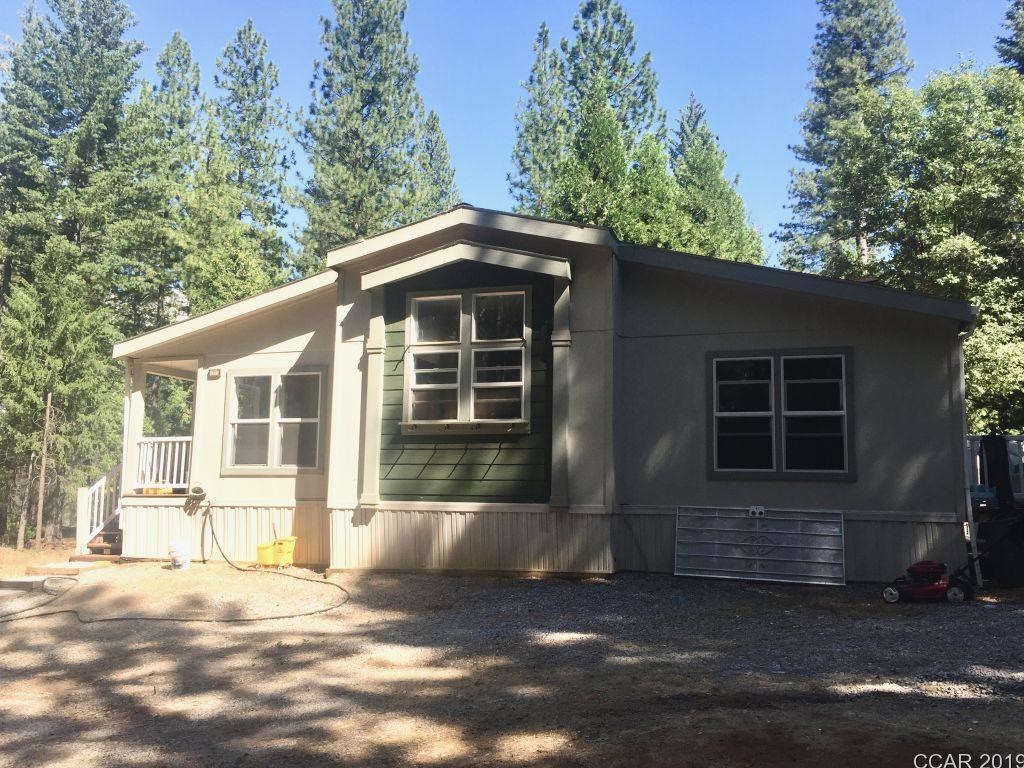 3855 Tree West Point, CA 95255 - Photo 1 of 1 a front view of a house with a yard and garage
