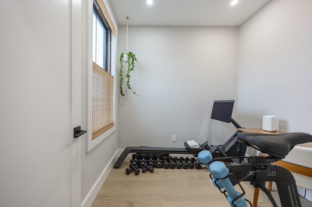 70 Shawsheen Road, Unit PH5 Boston, MA 02128 - Photo 30 of 42 a bedroom with a bed and a window