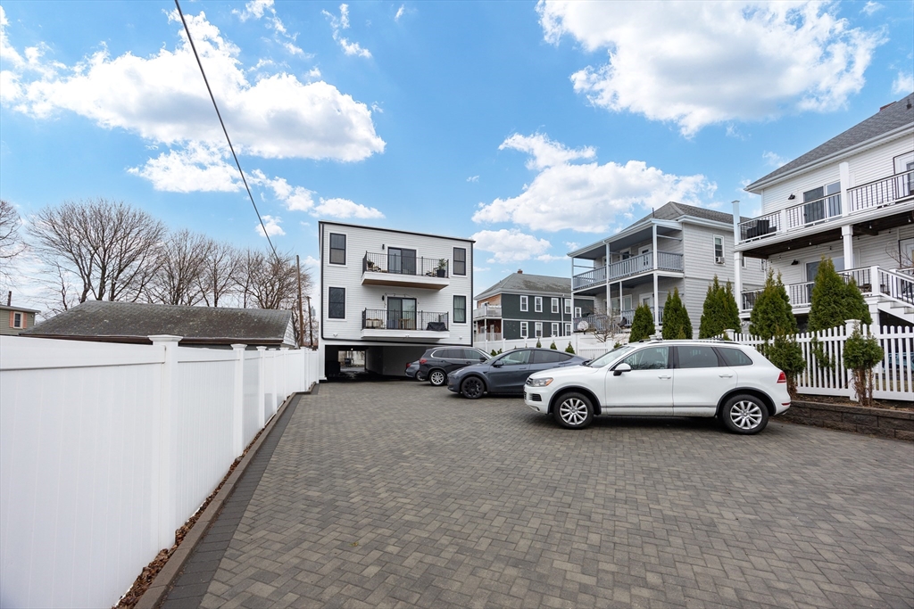 70 Shawsheen Road, Unit PH5 Boston, MA 02128 - Photo 42 of 42 a cars parked in front of a building
