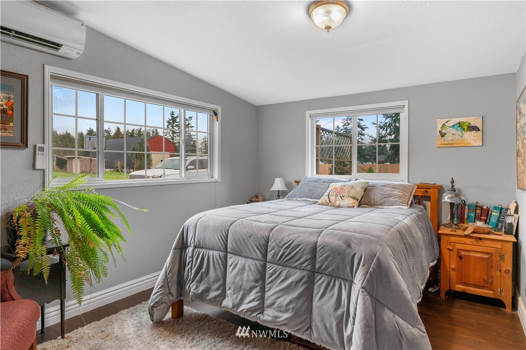 7232 191st Avenue Southwest Rochester, WA 98579 - Photo 20 of 40 a bedroom with a bed and a window