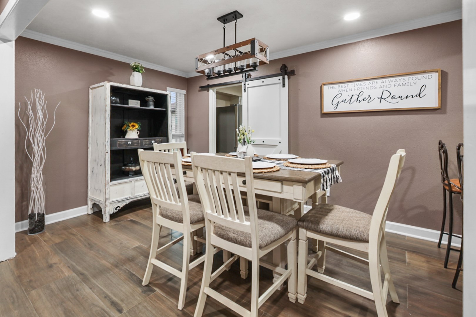 4505 Country Club View Baytown, TX 77521 - Photo 12 of 42 a view of a dining room with furniture window and wooden floor