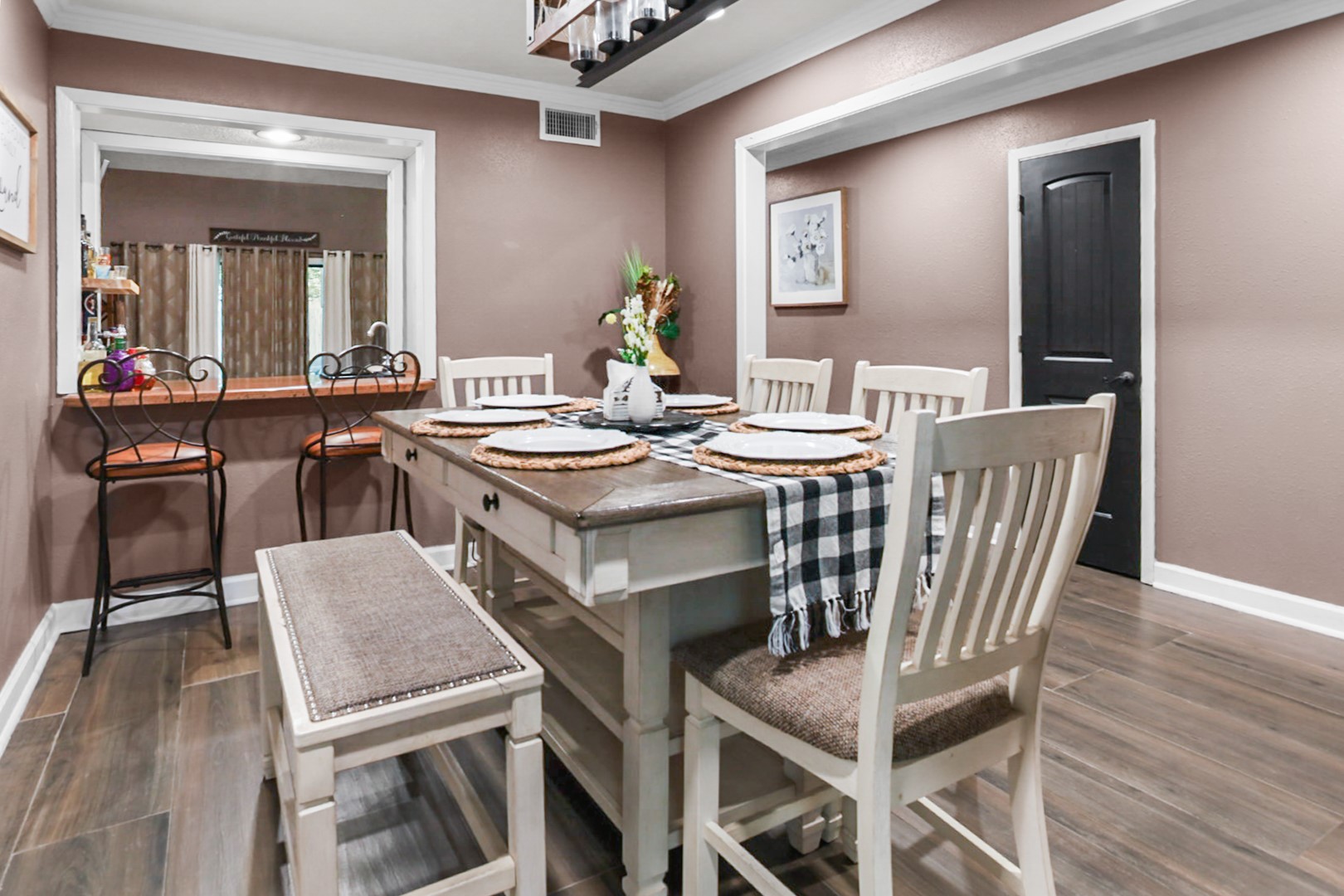 4505 Country Club View Baytown, TX 77521 - Photo 14 of 42 a view of a dining room with furniture and wooden floor