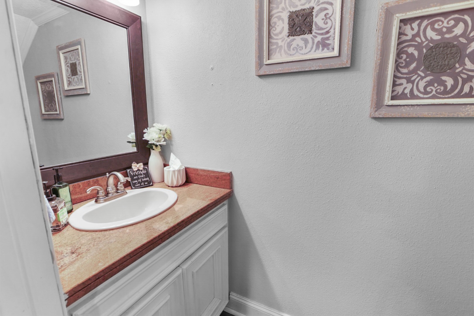 4505 Country Club View Baytown, TX 77521 - Photo 20 of 42 a bathroom with a sink and a mirror