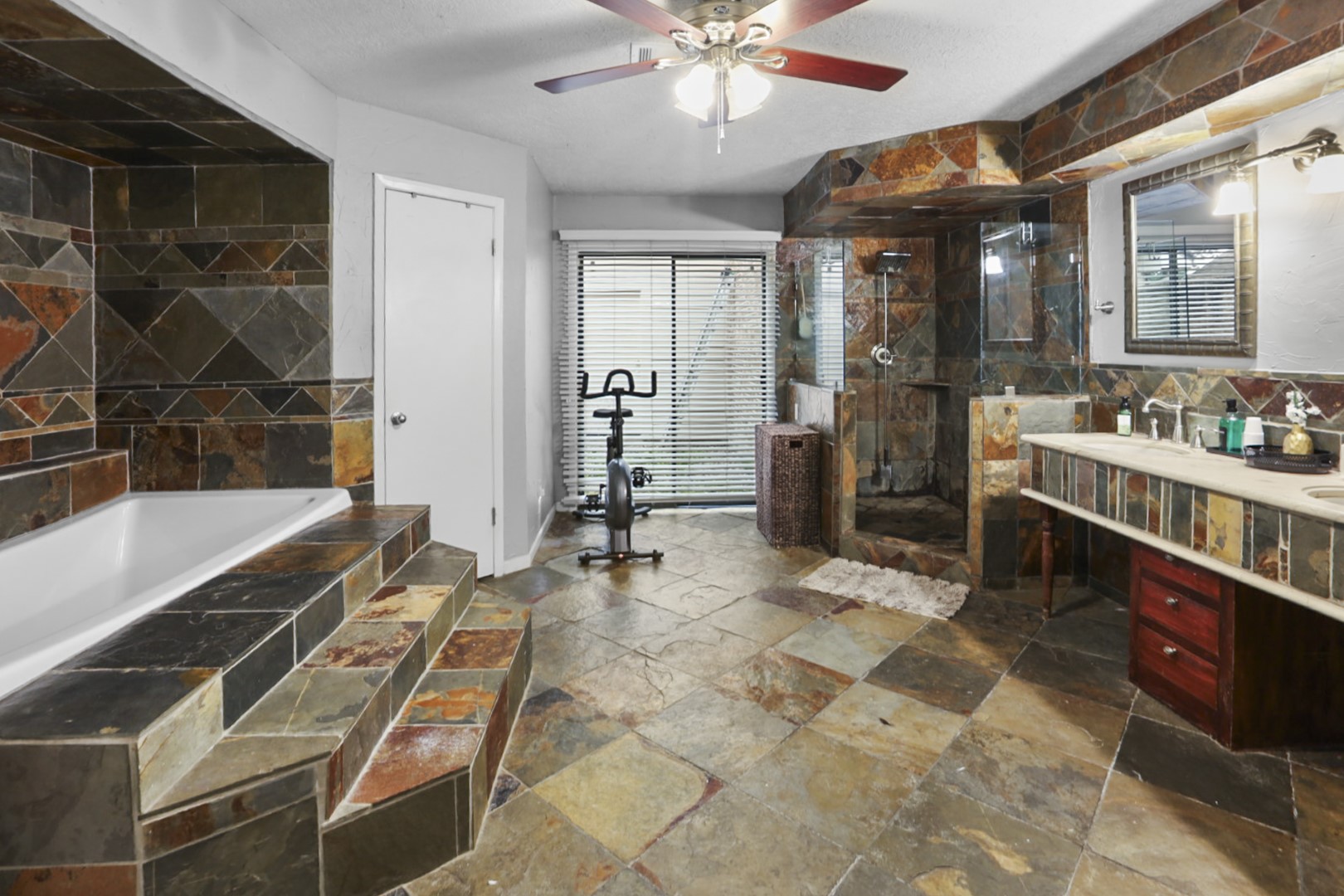 4505 Country Club View Baytown, TX 77521 - Photo 25 of 42 a room with gym equipment and a mirror