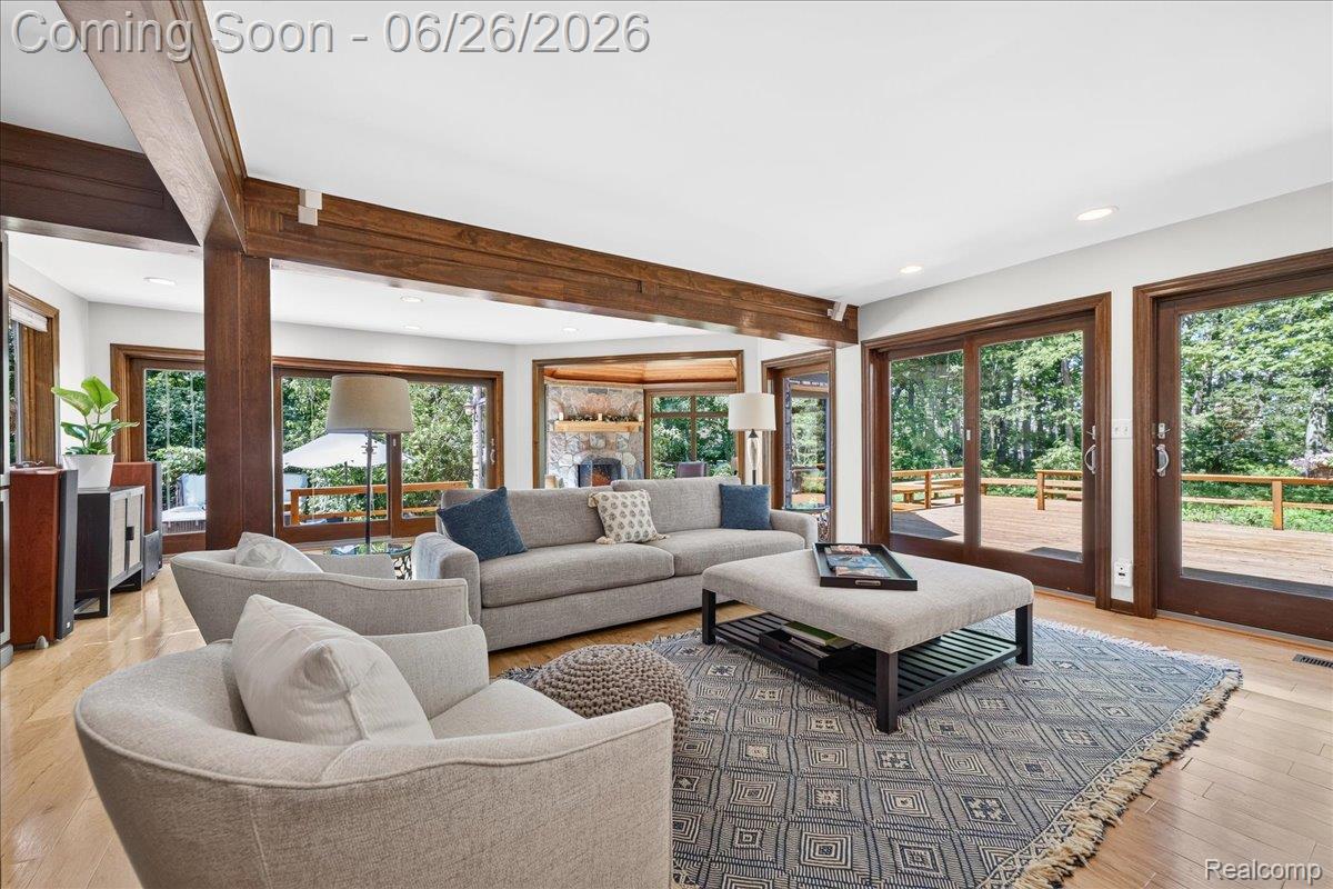 29498 East River Road Grosse Ile, MI 48138 - Photo 24 of 66 Living Room with Doorwall to Cedar Deck