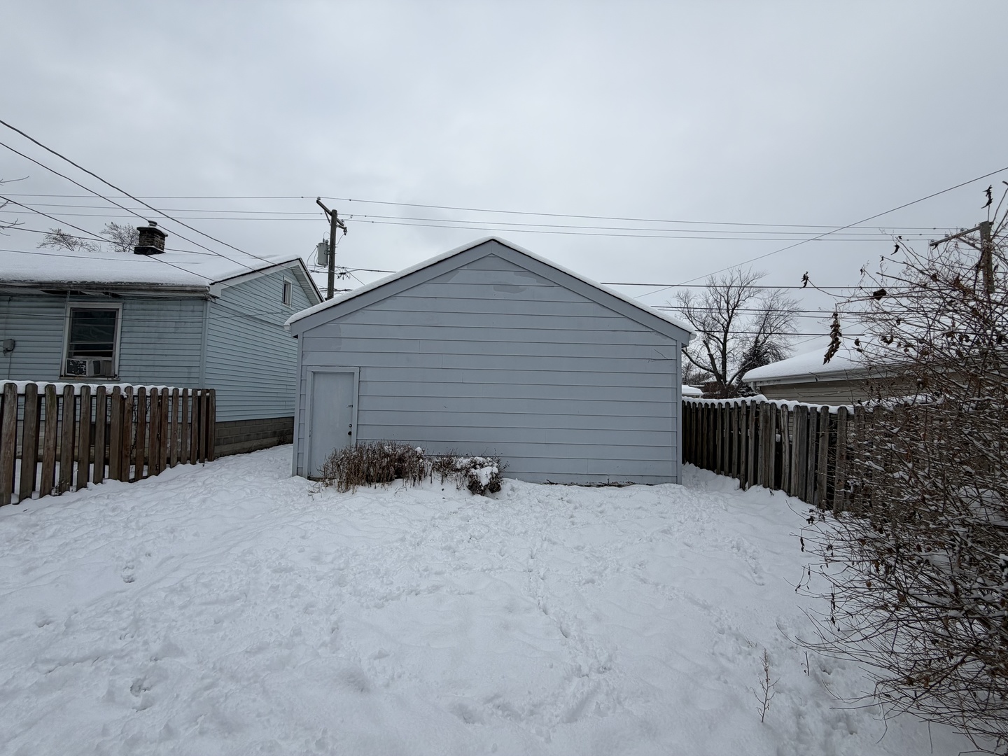 12504 Maple Avenue Blue Island, IL 60406 - Photo 10 of 10 a view of a house with wooden fence