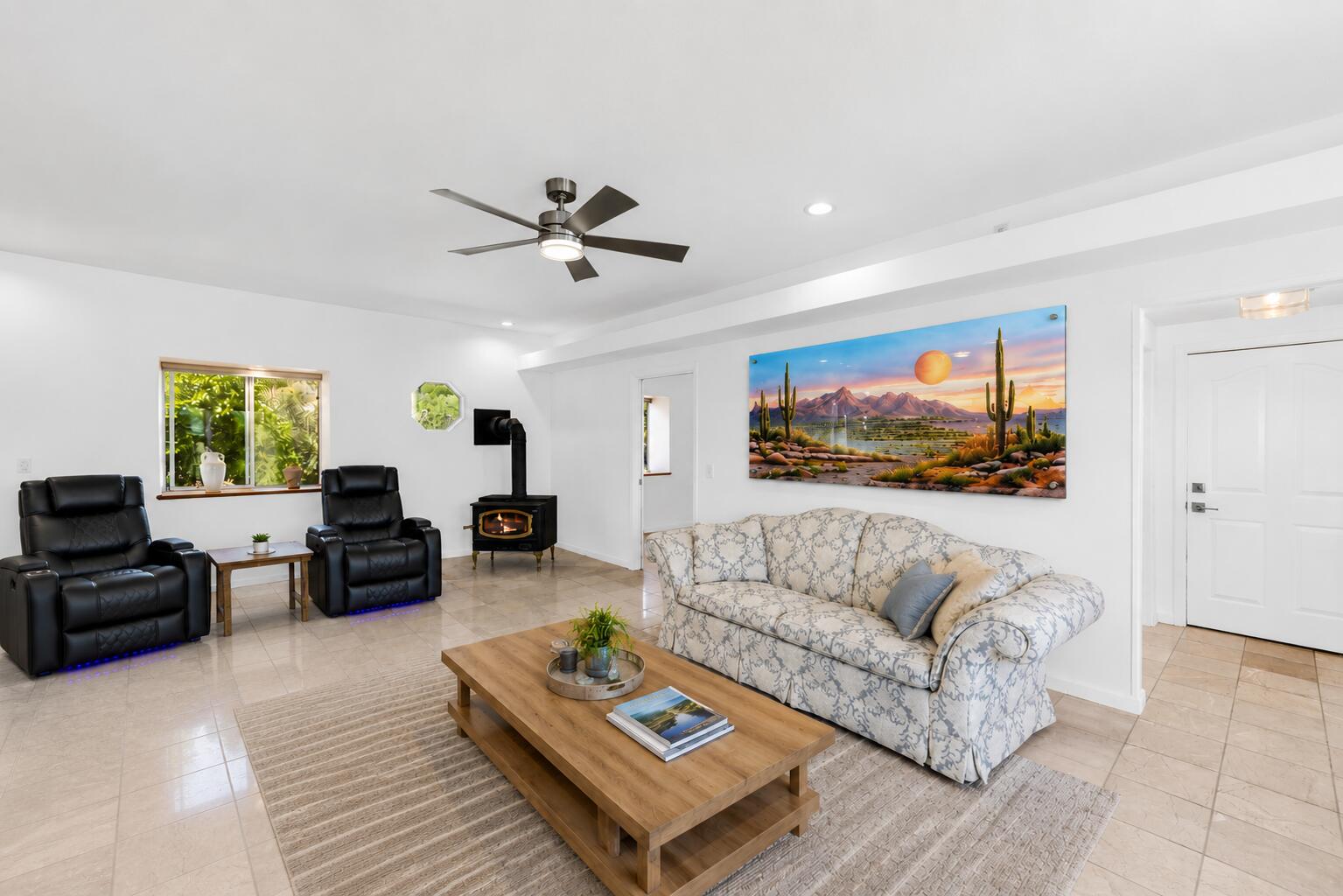 60425 Santa Rosa Road Mountain Center, CA 92561 - Photo 13 of 59 a living room with furniture ceiling fan and a rug