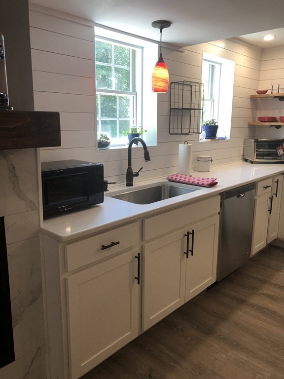 1 Park Road, Unit 1 Sandwich, MA 02644 - Photo 3 of 25 a kitchen with a sink cabinets and window