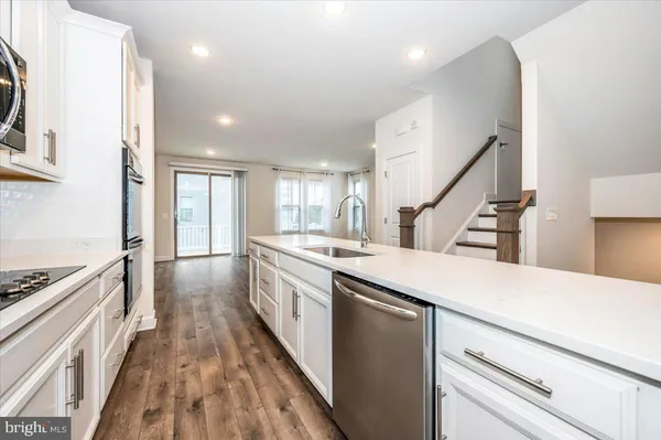 a view of a balcony with wooden floor