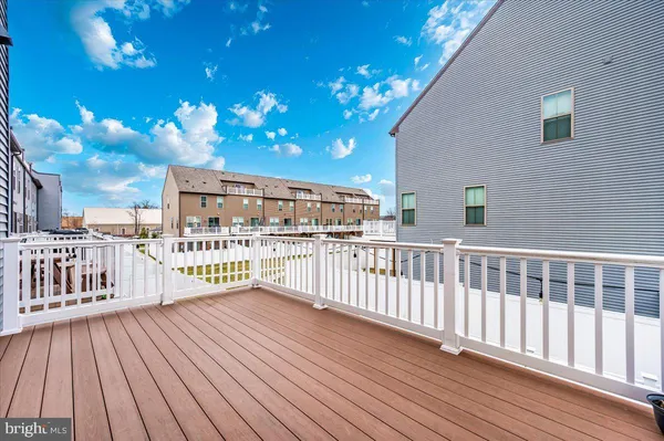 a view of a hallway with windows