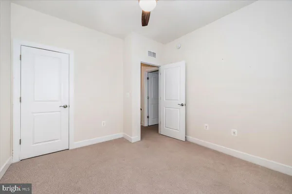 a view of room with stairs and a window