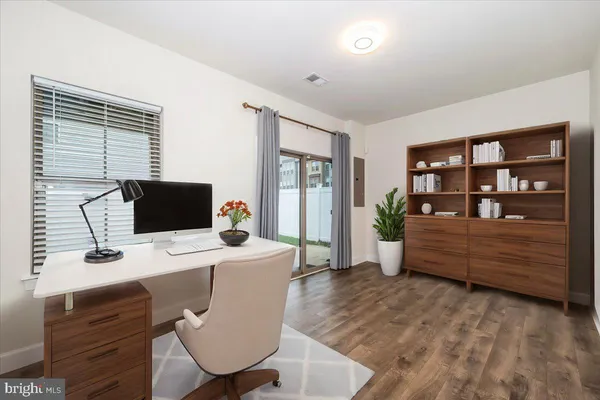 a view of a building with a yard