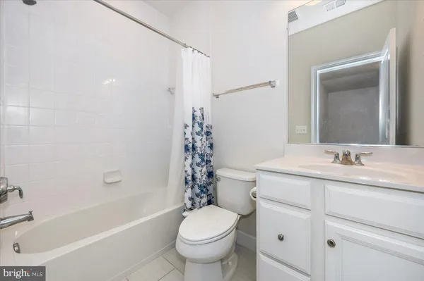 a view of house with backyard porch and seating area