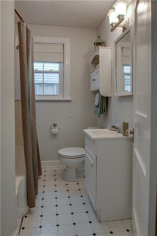 4121 Aberdeen Road Nashville, TN 37205 - Photo 8 of 20 a bathroom with a sink a toilet and mirror