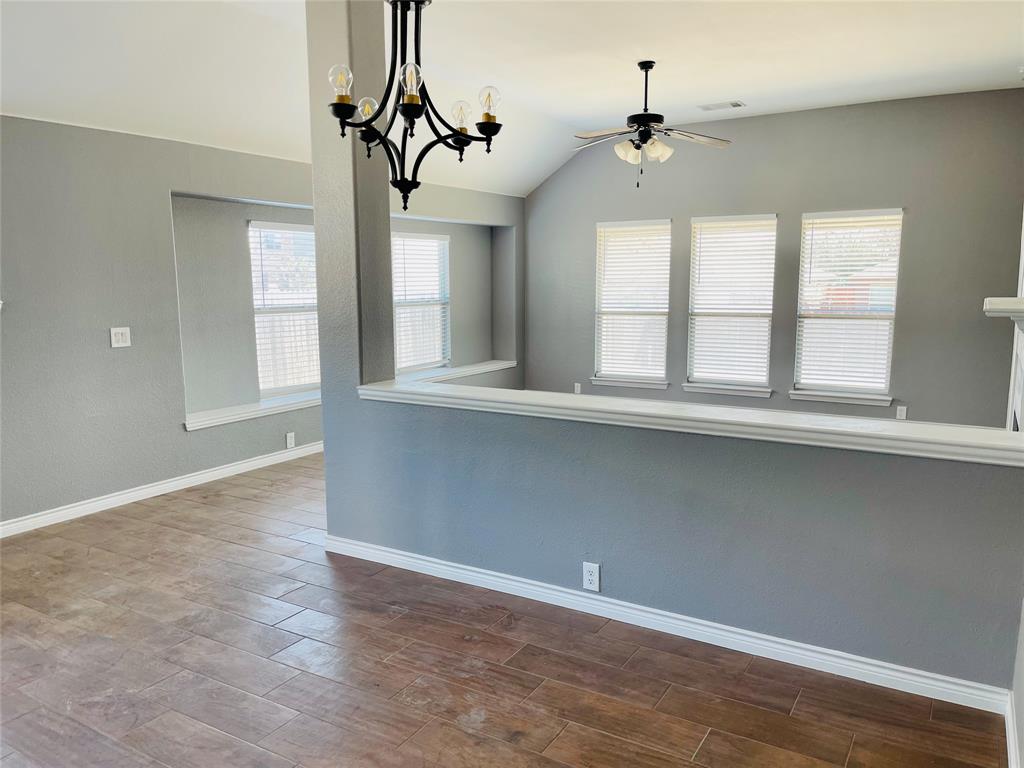 548 Kerry Street Crowley, TX 76036 - Photo 10 of 35 a view of an empty room with a window