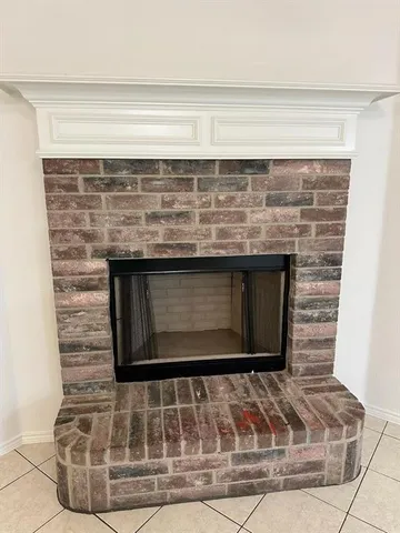 a large kitchen with cabinets and stainless steel appliances