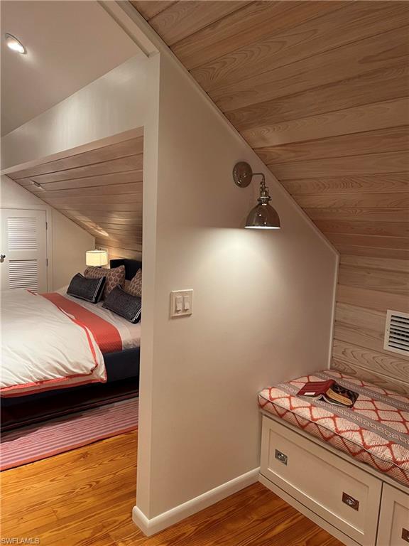 105 Useppa Bokeelia, FL 33922 - Photo 13 of 39 a bedroom with a bed and a stove