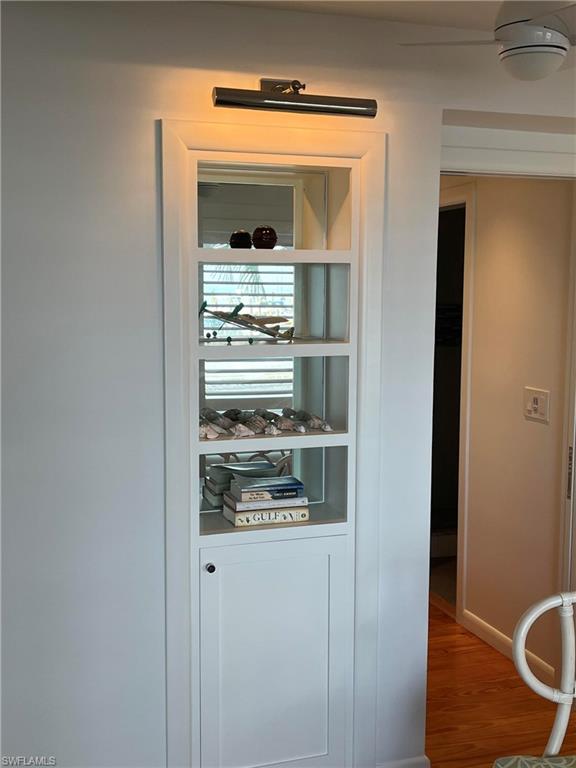 105 Useppa Bokeelia, FL 33922 - Photo 21 of 39 a kitchen with a refrigerator and cabinets