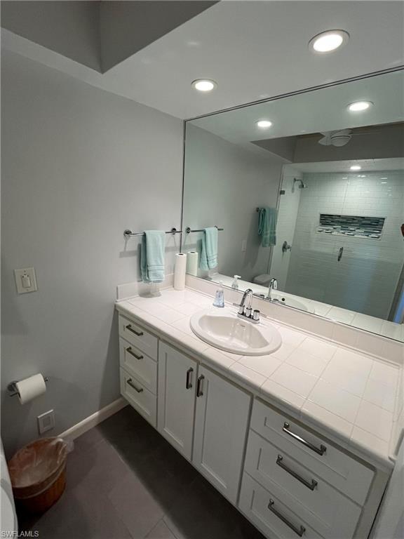 105 Useppa Bokeelia, FL 33922 - Photo 22 of 39 a bathroom with a double vanity sink and a mirror