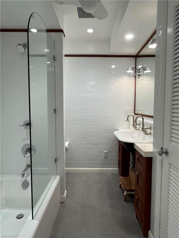 105 Useppa Bokeelia, FL 33922 - Photo 25 of 39 a bathroom with a shower sink and mirror