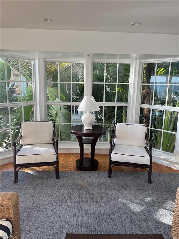 105 Useppa Bokeelia, FL 33922 - Photo 5 of 39 a balcony with chairs and a table