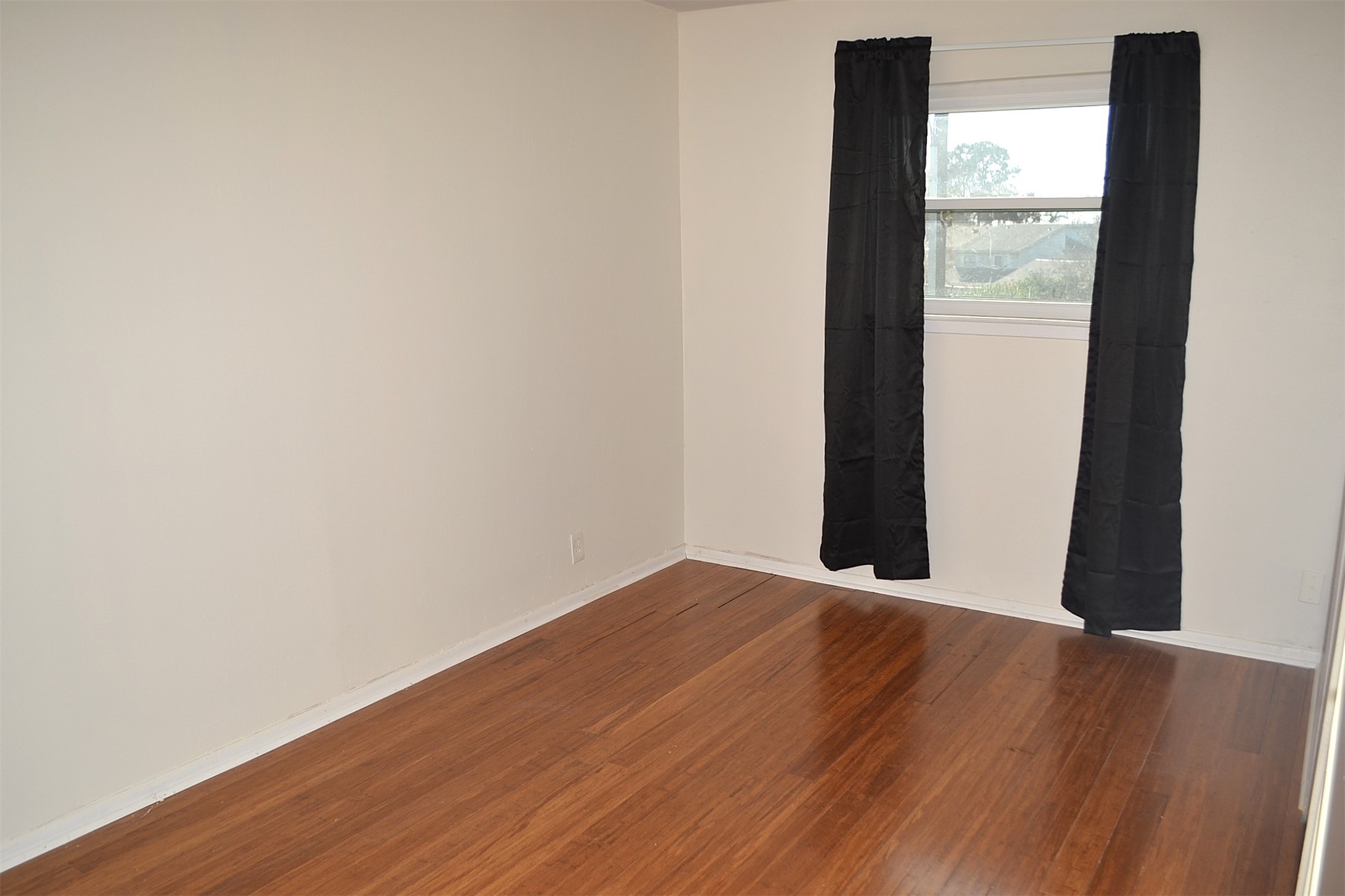 2931 Whitman Drive Montgomery, TX 77356 - Photo 35 of 49 a view of a big room with wooden floor and windows
