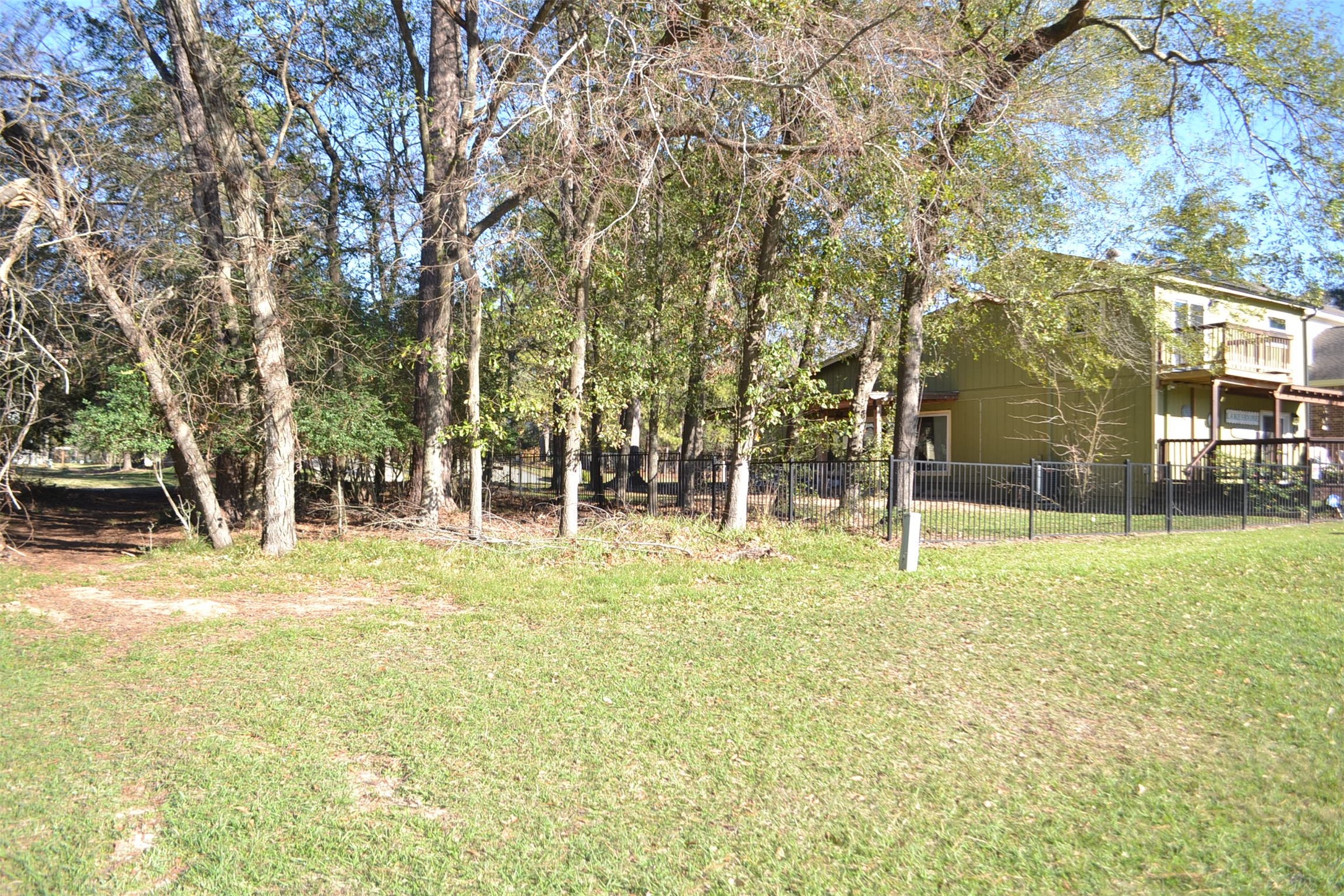 2931 Whitman Drive Montgomery, TX 77356 - Photo 41 of 49 a swimming pool with trees in front of it