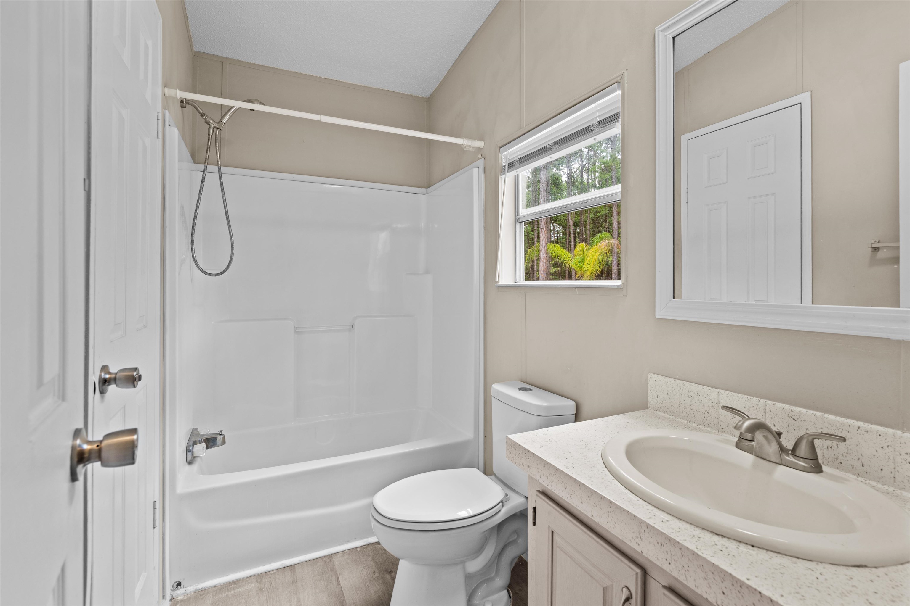 2130 Carter Road St. Augustine, FL 32084 - Photo 37 of 67 Full bath featuring vanity, bathing tub / shower combination, and light wood-style flooring