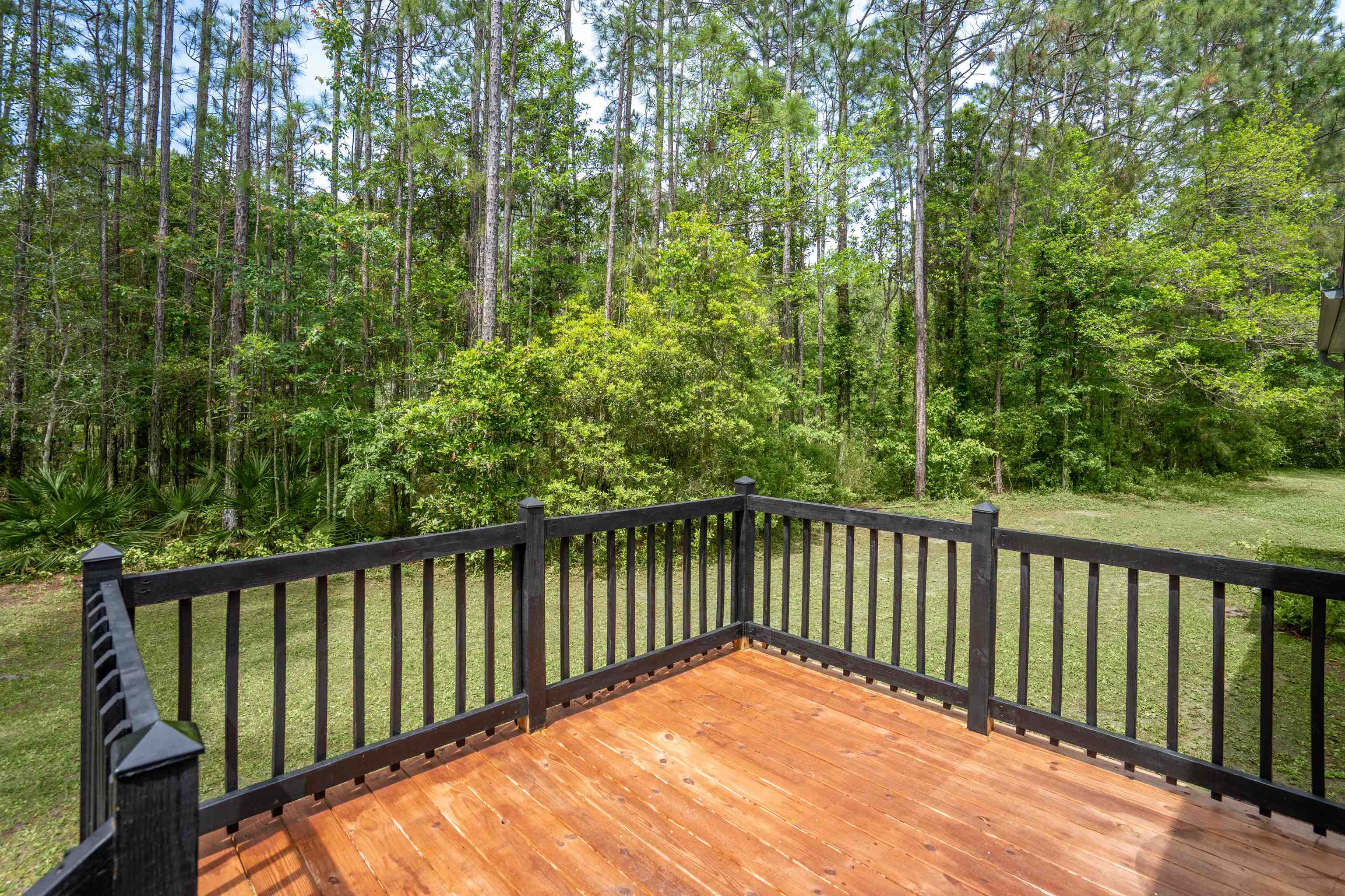 2130 Carter Road St. Augustine, FL 32084 - Photo 5 of 67 Wooden deck with a yard