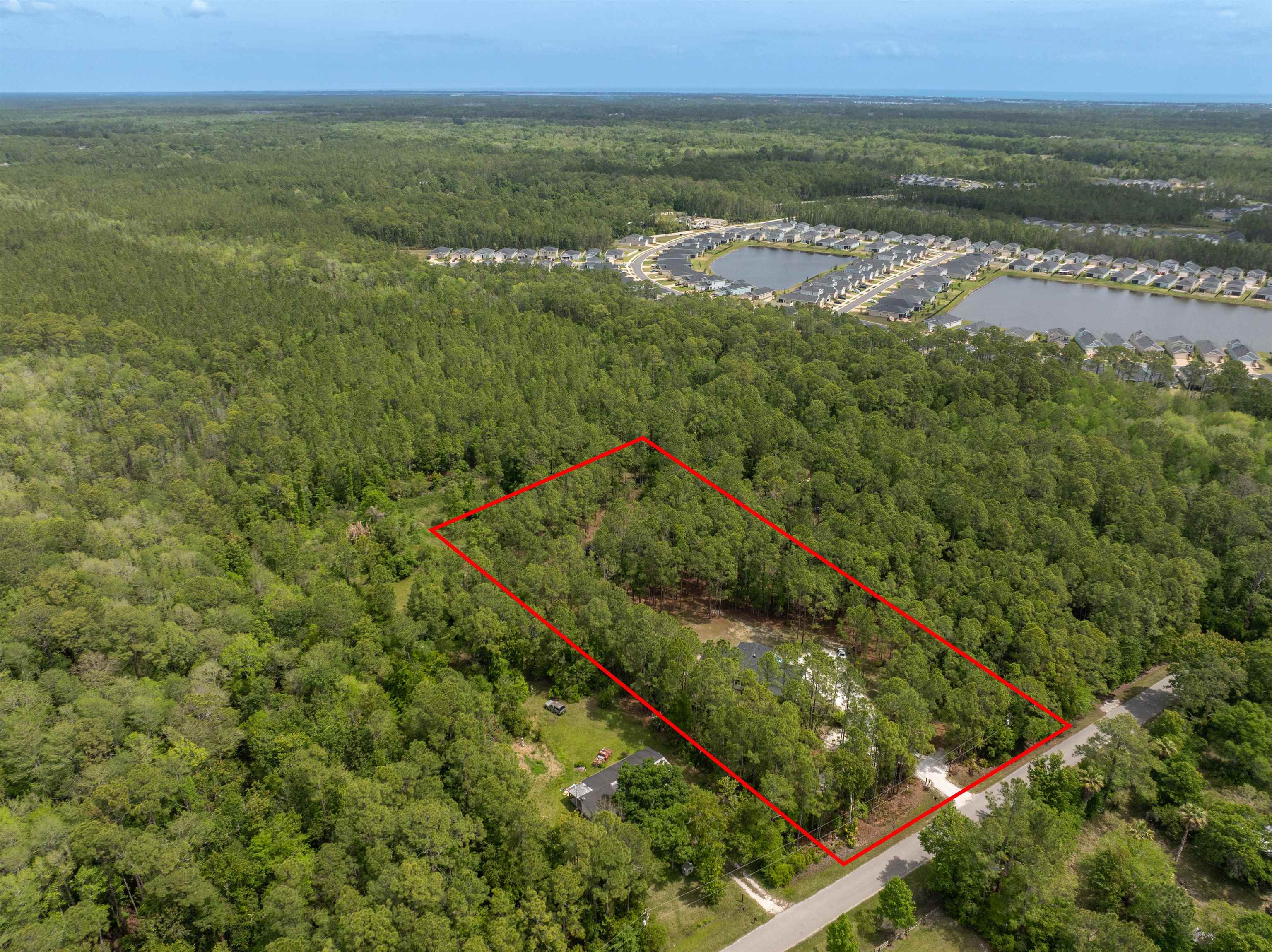 2130 Carter Road St. Augustine, FL 32084 - Photo 54 of 67 View of property location with a heavily wooded area and property parcel outlined