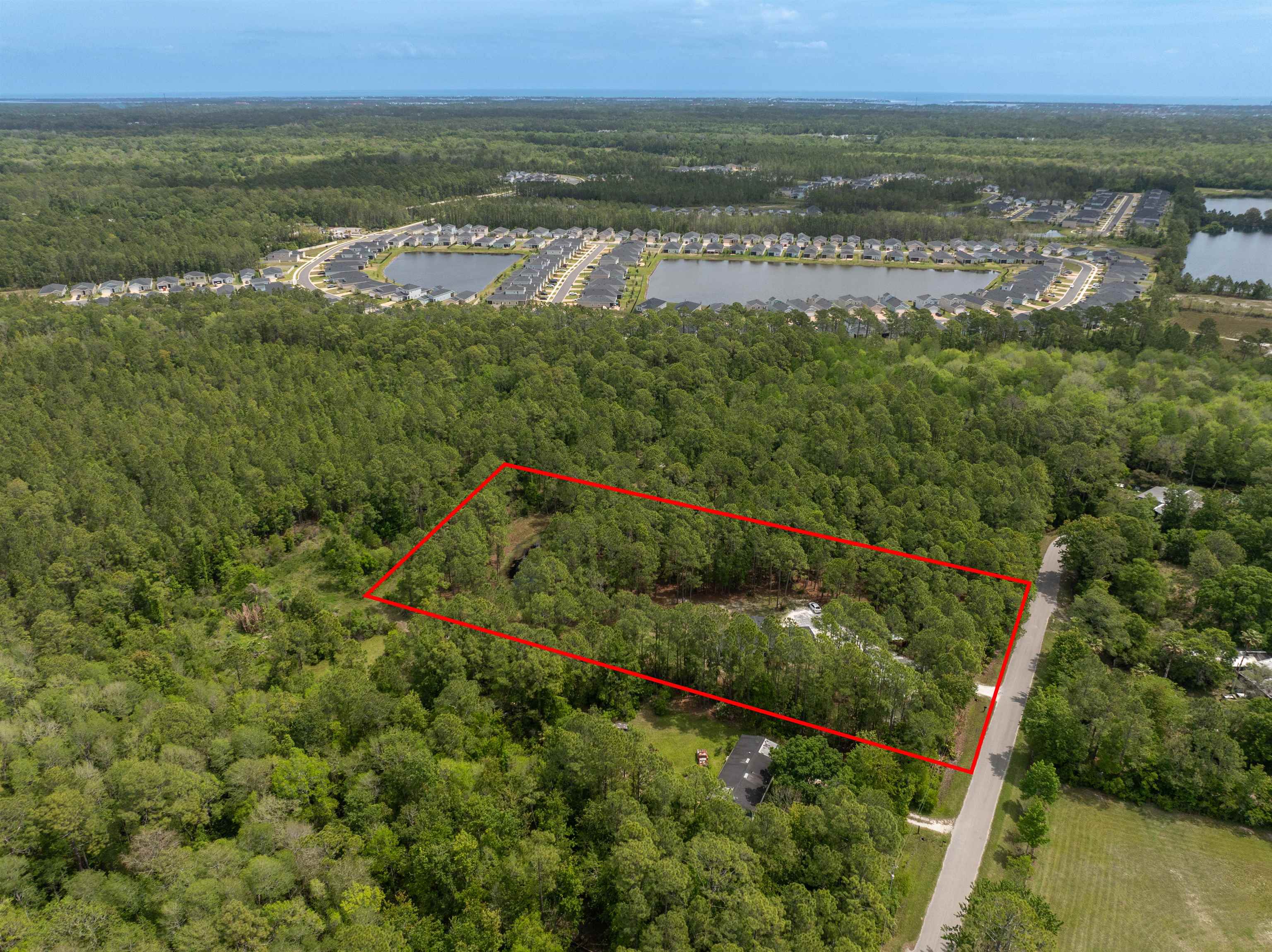 2130 Carter Road St. Augustine, FL 32084 - Photo 56 of 67 Aerial overview of property's location with property boundaries highlighted and a large body of water