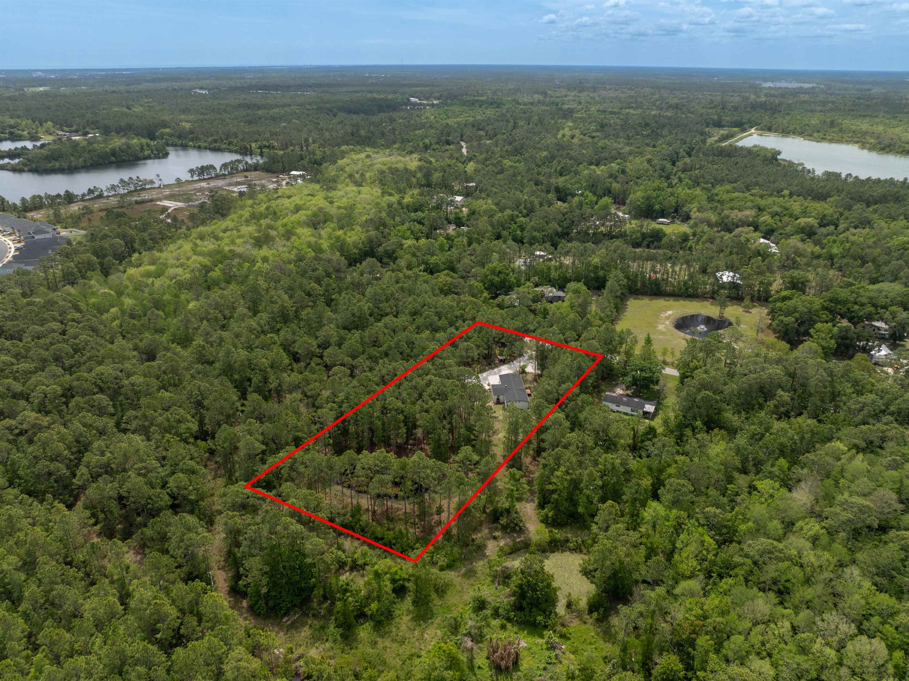 2130 Carter Road St. Augustine, FL 32084 - Photo 59 of 67 Aerial overview of property's location with a nearby body of water and property parcel outlined