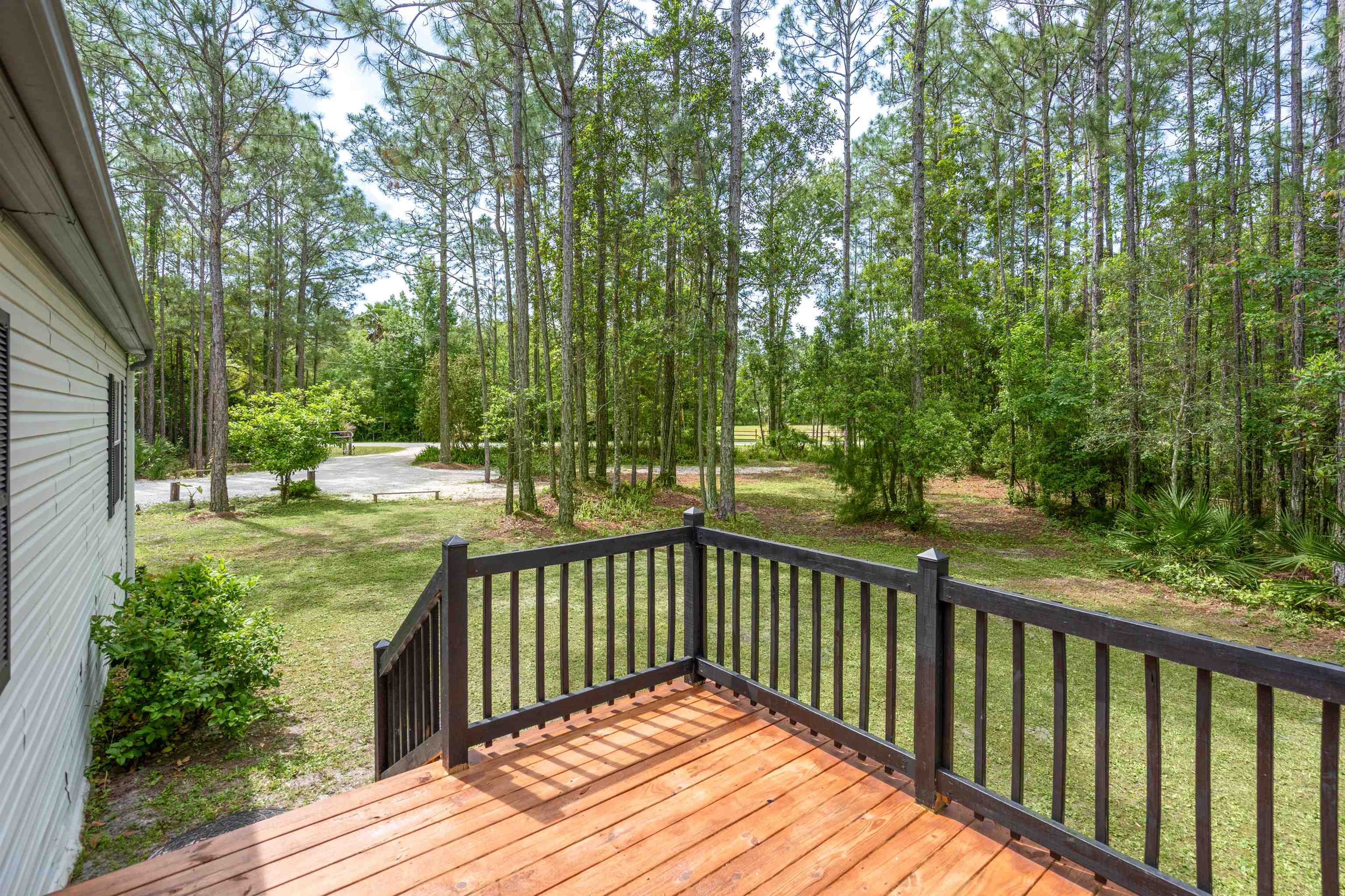 2130 Carter Road St. Augustine, FL 32084 - Photo 6 of 67 Deck with a yard