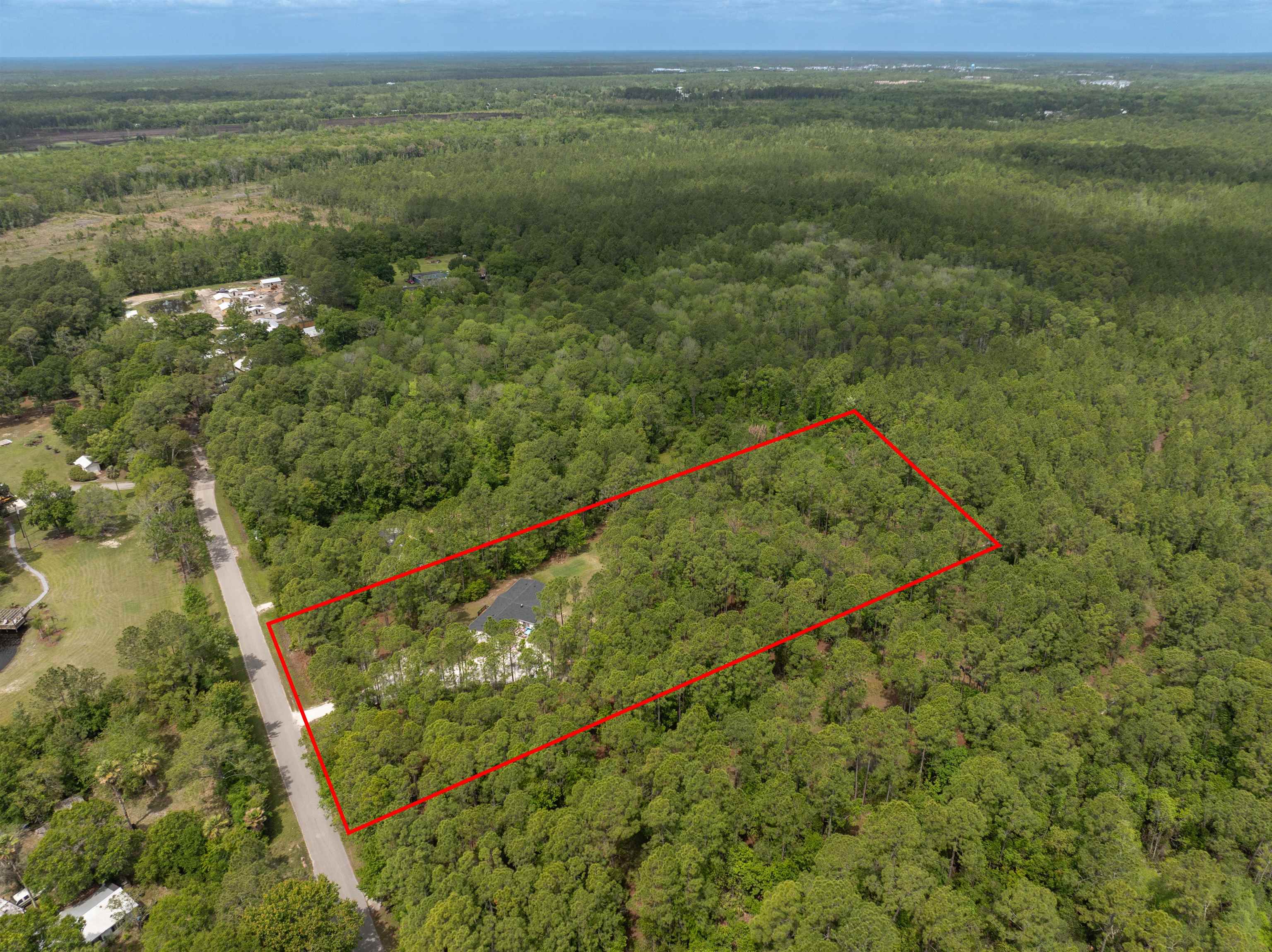 2130 Carter Road St. Augustine, FL 32084 - Photo 61 of 67 View of property location featuring a heavily wooded area and property parcel outlined
