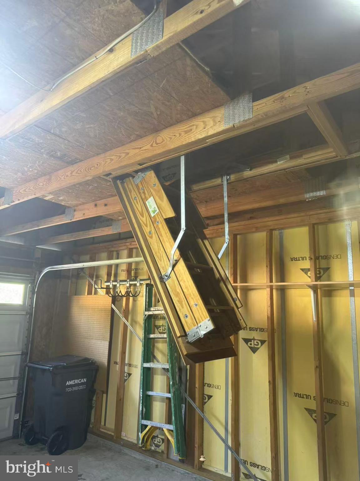 9231 Ribbon Falls Loop Bristow, VA 20136 - Photo 34 of 40 Extra storage space in garage attic