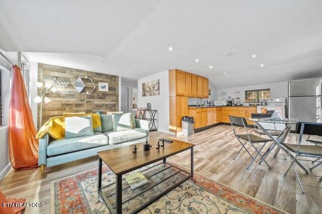 4204 Dellinger Hollow Road, Unit 2 Sevierville, TN 37863 - Photo 4 of 13 a living room with furniture and a table