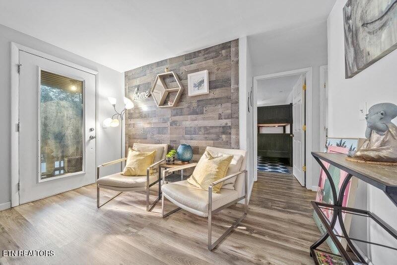 4204 Dellinger Hollow Road, Unit 2 Sevierville, TN 37863 - Photo 7 of 13 a living room with furniture and a fireplace