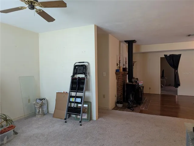 a room with furniture and gym equipment