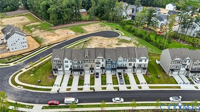 a view of swimming pool with outdoor seating