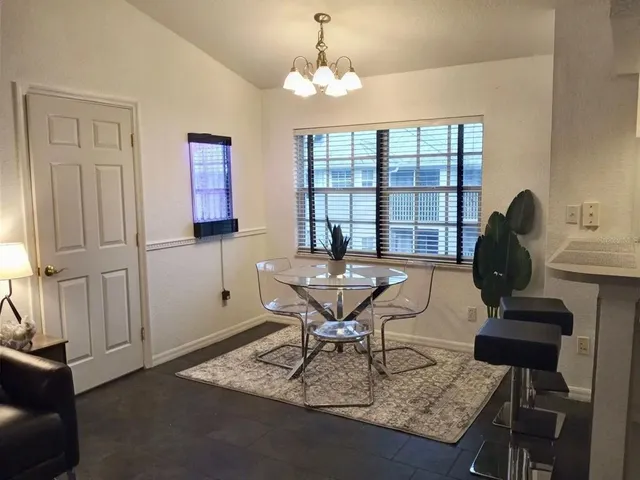 a workspace with furniture and window