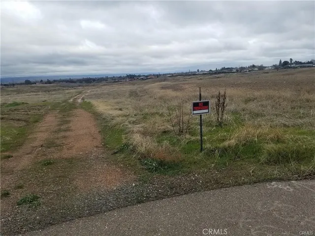 a view of a lake with a yard