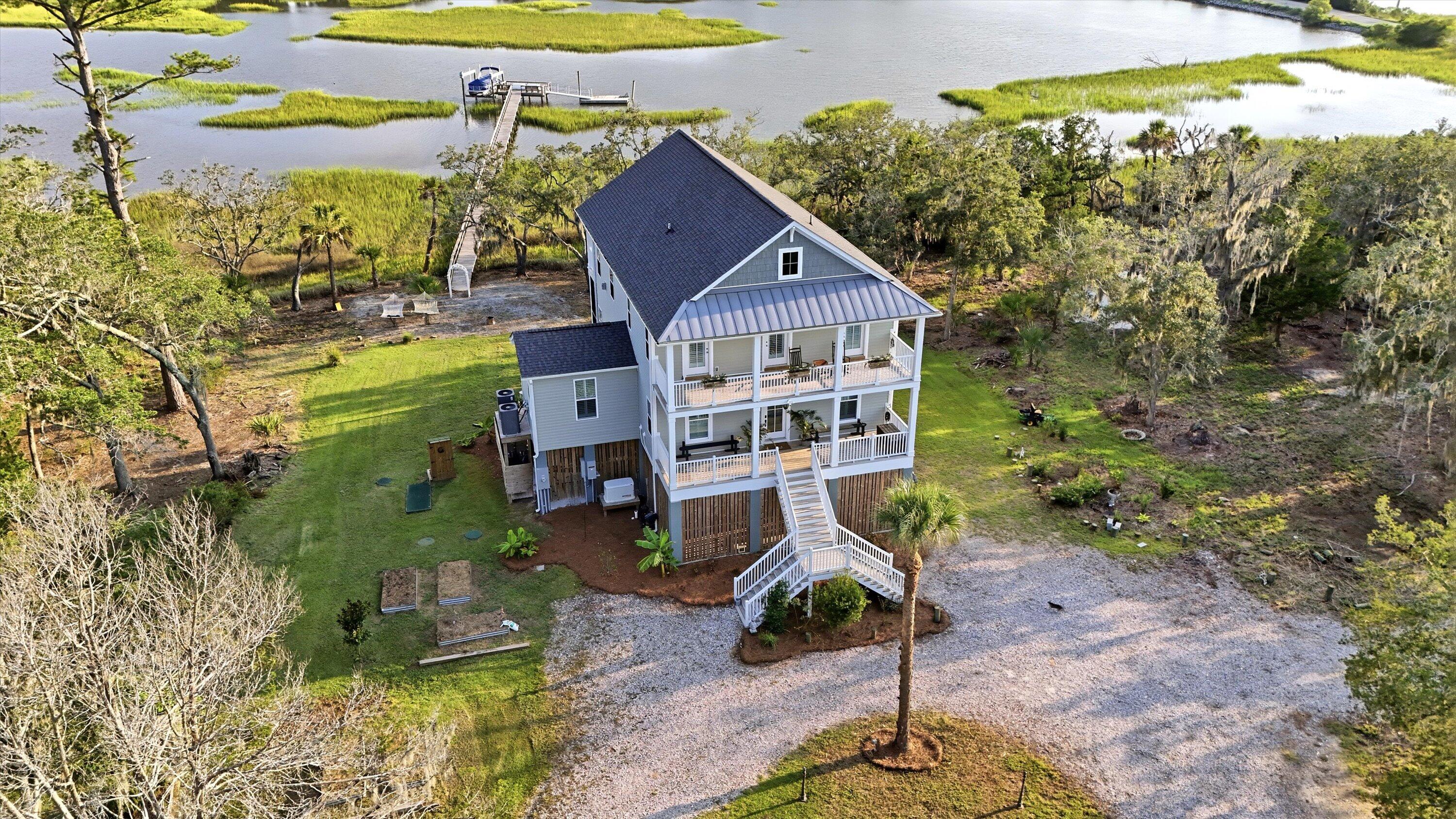 8176 Rosa Scott Road Edisto Island, SC 29438 - Photo 2 of 67 03-058-dji-20260823184007-0005-d-jpg
