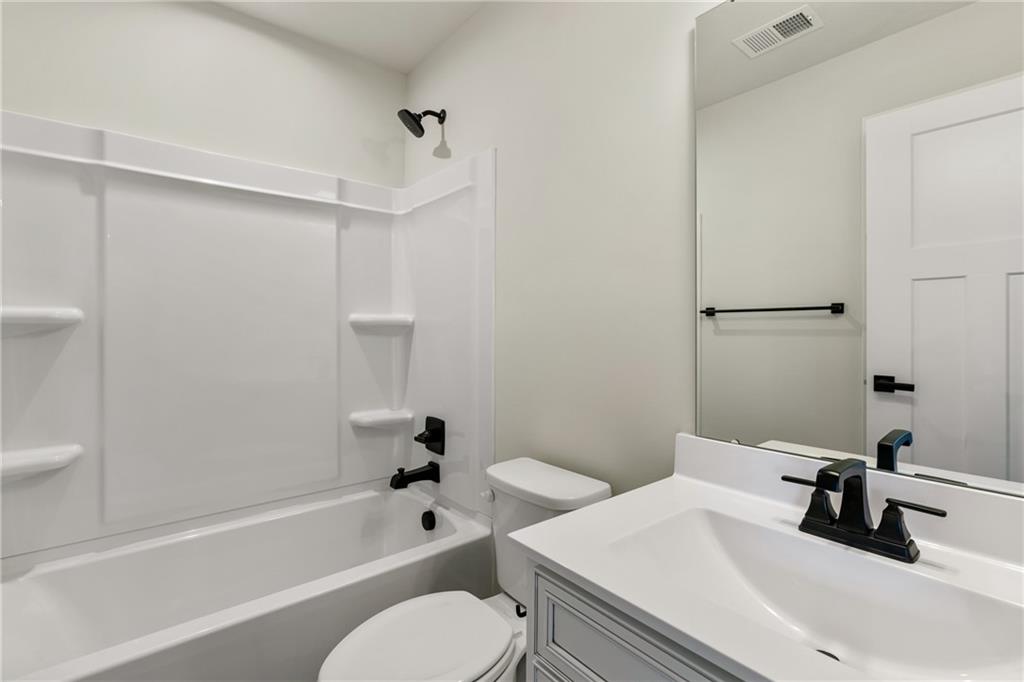 157 Crown Street McKees Rocks, PA 15136 - Photo 18 of 23 a bathroom with a sink a toilet and a bathtub