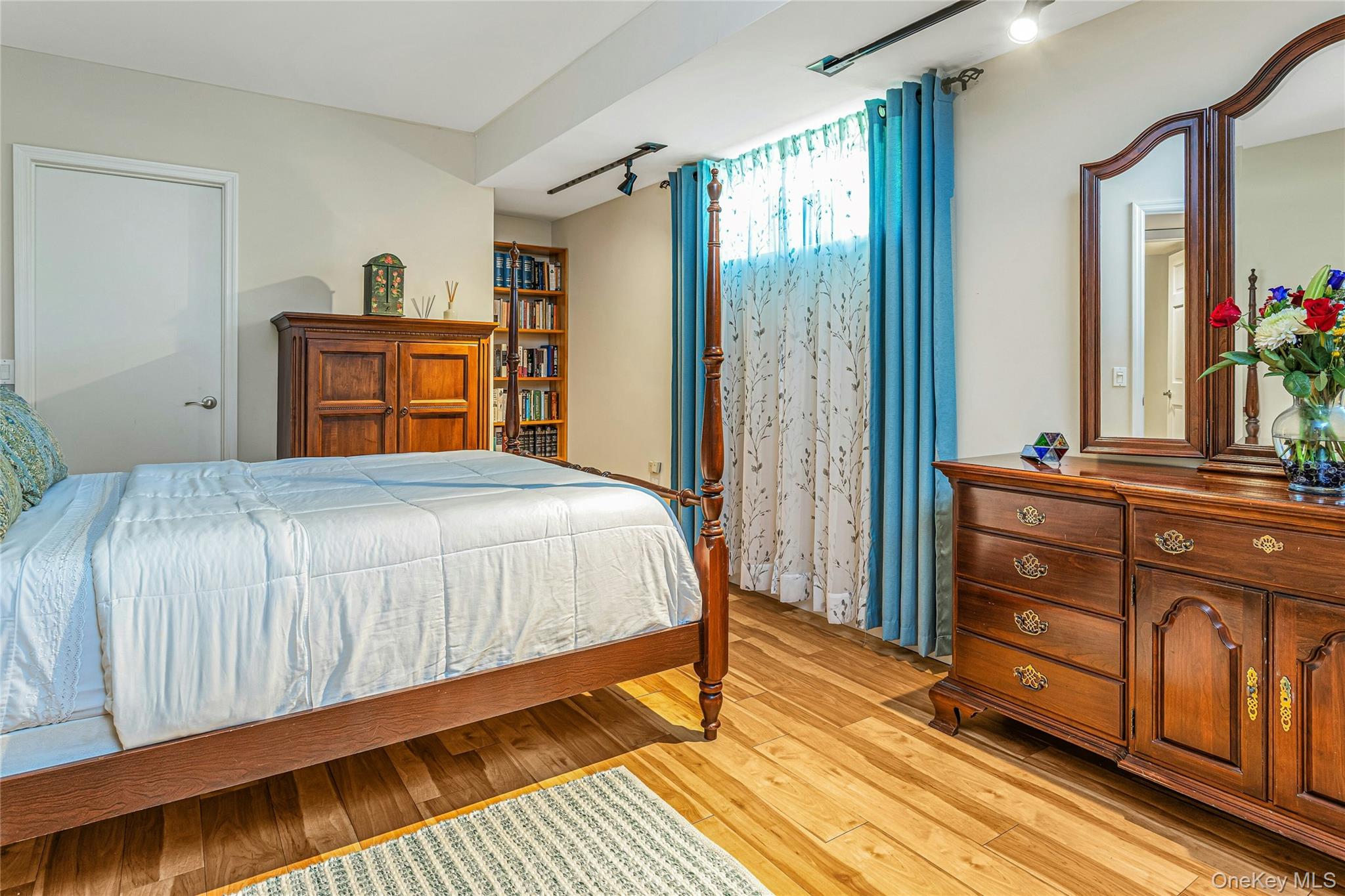 340 Osceola Road Jefferson Valley, NY 10535 - Photo 27 of 48 a bedroom with a bed and a dresser