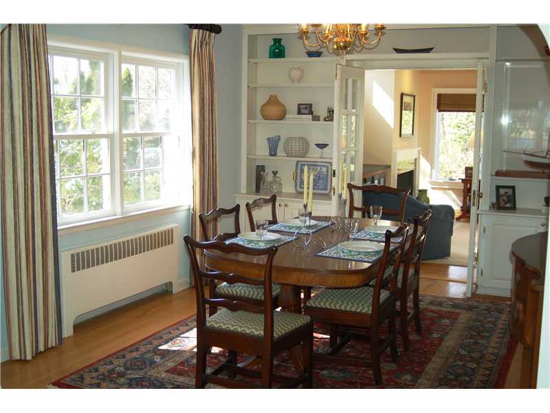 103 Summit Road Riverside, CT 06878 - Photo 7 of 17 a view of a dining room with furniture and wooden floor