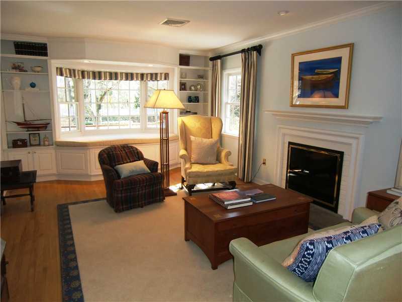 103 Summit Road Riverside, CT 06878 - Photo 8 of 17 a living room with furniture fireplace and a large window