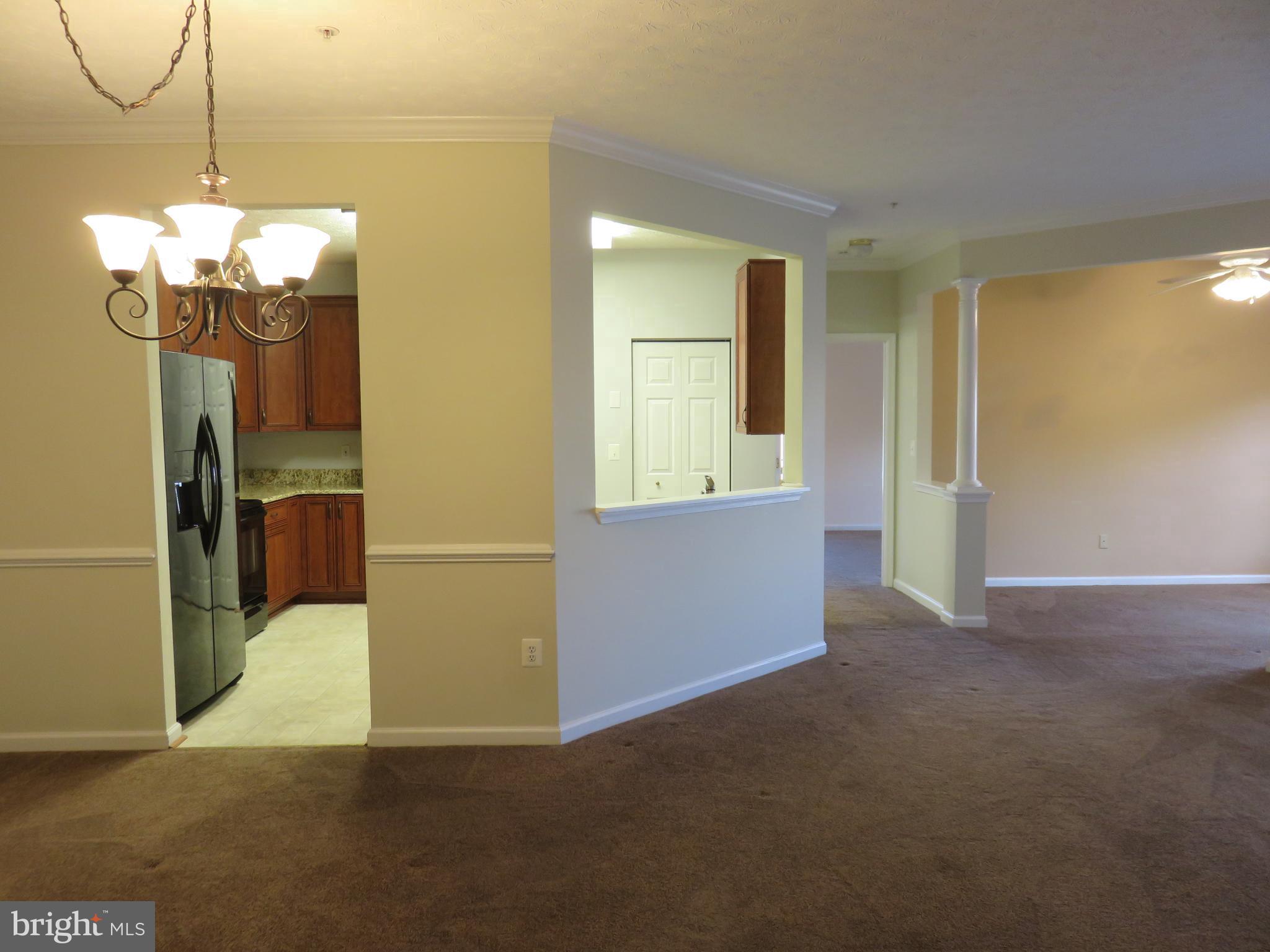 9615 Haven Farm Road, Unit F Perry Hall, MD 21128 - Photo 11 of 25 PASS THROUGH FROM KITCHEN INTO DR/LR